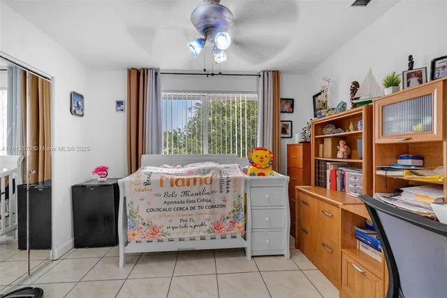 a room with furniture a window and storage