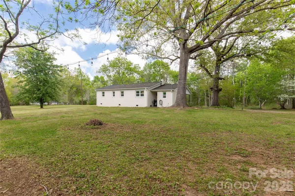 a house view with a garden space
