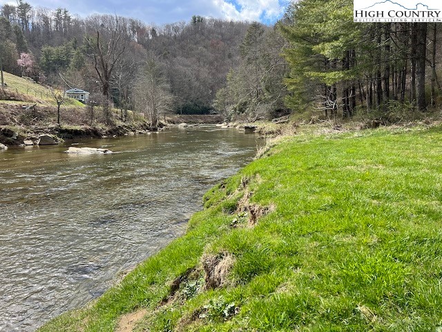 Lot #12 River Spring Road Sugar Grove, NC 28679 - Photo 13 of 21 a view of a lake with houses