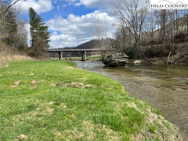Lot #12 River Spring Road Sugar Grove, NC 28679 - Photo 9 of 21 a view of a house with a yard