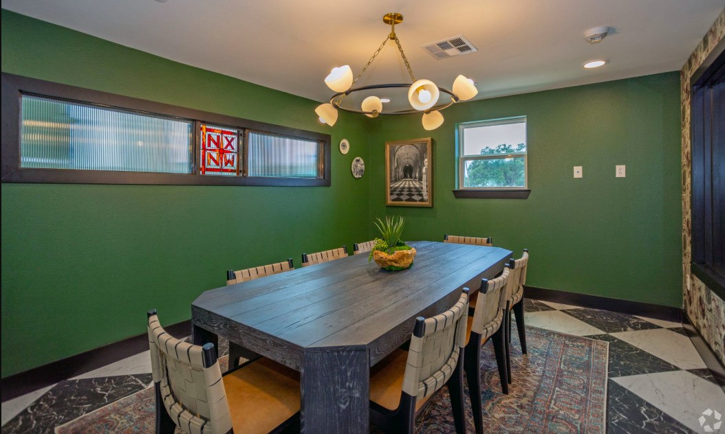 10010 North Capital Of Texas Highway Austin, TX 78759 - Photo 8 of 22 a view of a dining room with a table and chairs