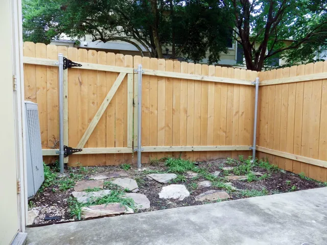 a view of backyard and bathroom