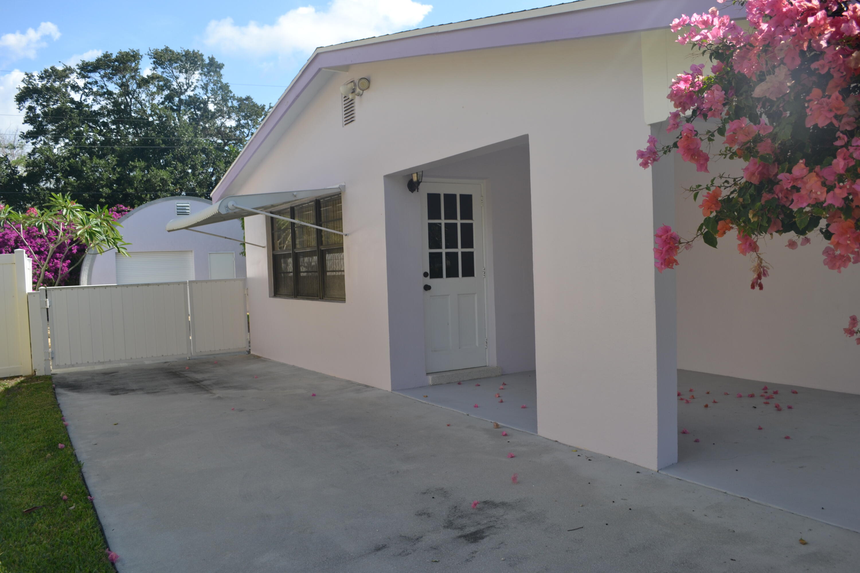 309 Southwest 3rd Street Boca Raton, FL 33432 - Photo 3 of 9 Carport plus garage