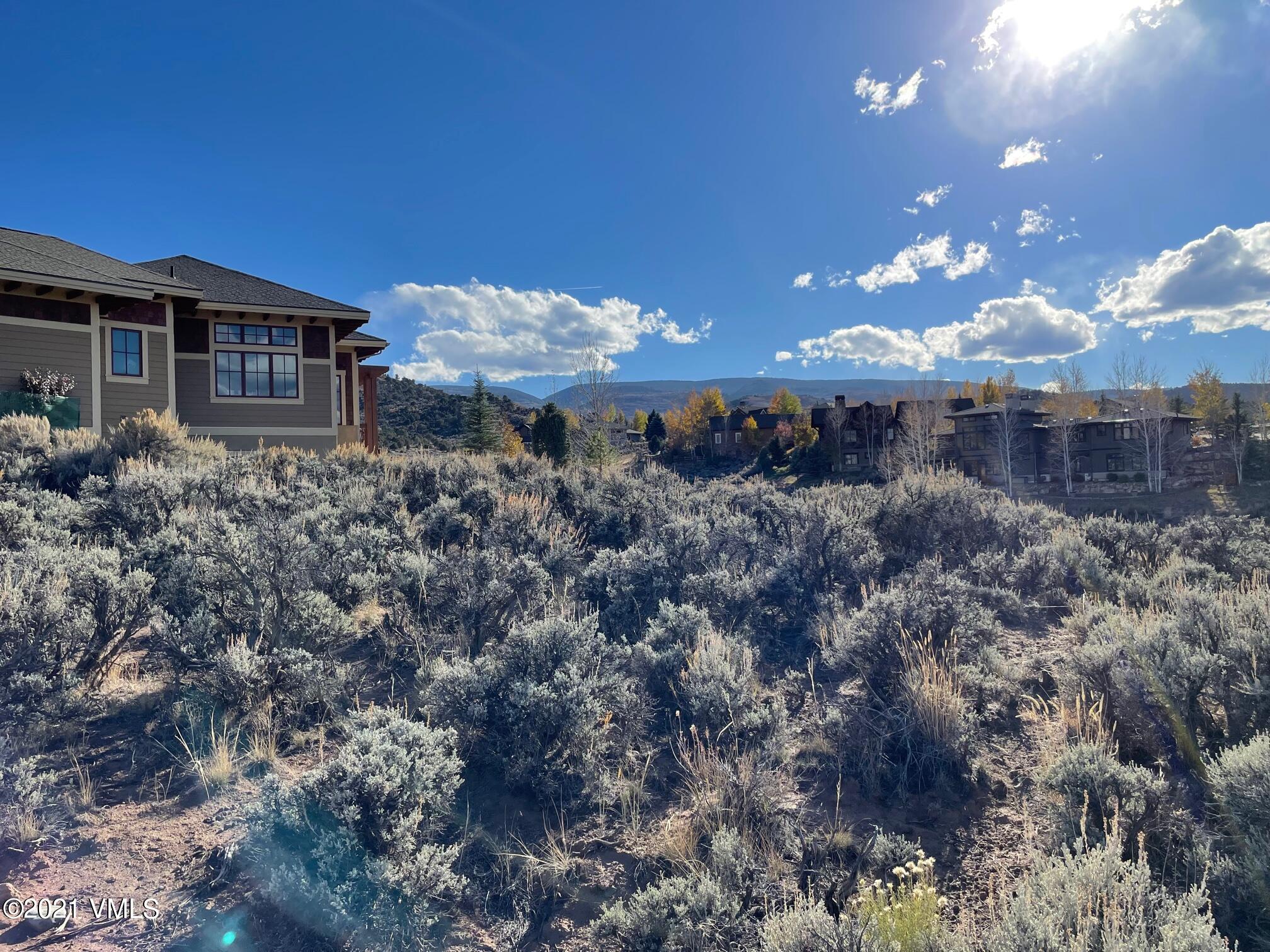 596 4th Of July Road Eagle, CO 81631 - Photo 4 of 4 a view of a house with a yard