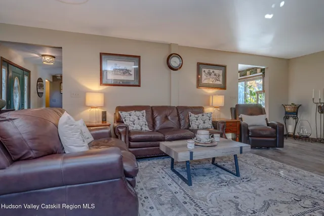 a living room with furniture and a couch