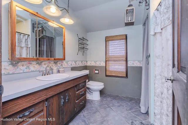 a view of a large body of water with a mountain