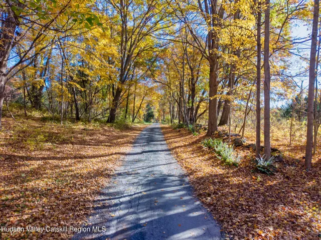 a view of a playground with basketball court
