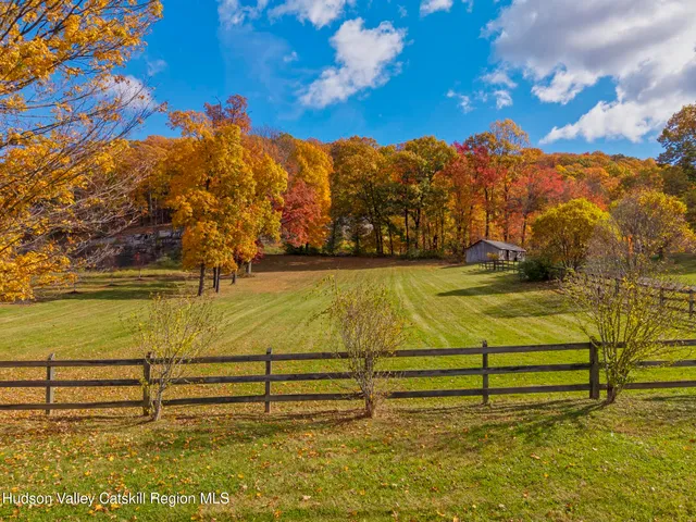 a view of swimming pool from a lake