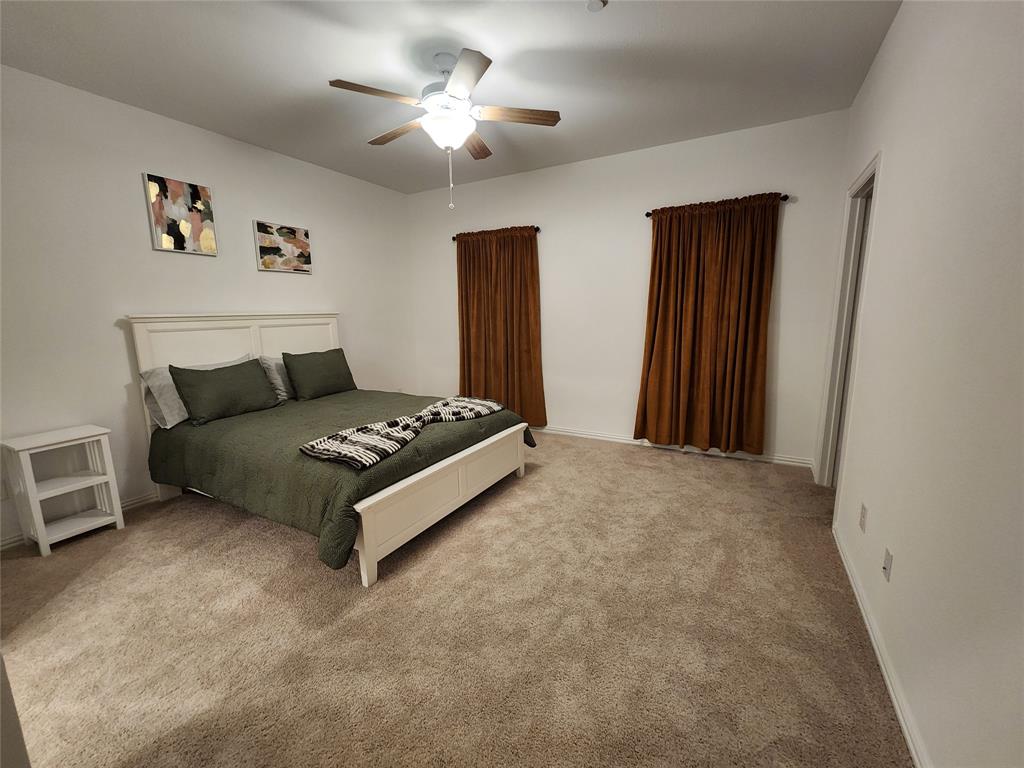 632 Blue Rdg Drive Mansfield, TX 76063 - Photo 10 of 16 a living room with furniture and a chandelier