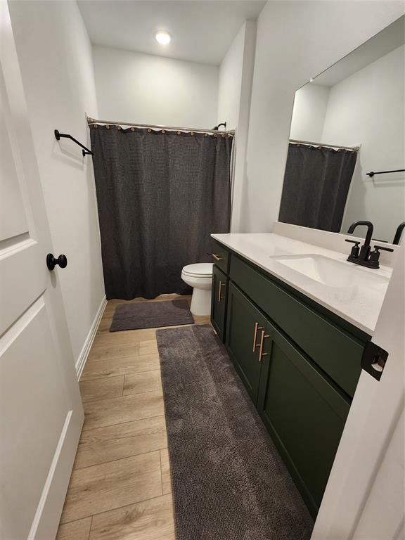 632 Blue Rdg Drive Mansfield, TX 76063 - Photo 13 of 16 a bathroom with a sink and a mirror