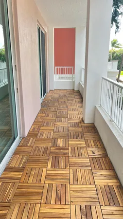 a view of a hallway with windows