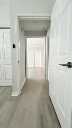 wooden floor and a hallway in a house