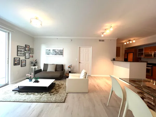 a living room with furniture and a table