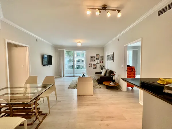 a bedroom with a bed and flat screen tv