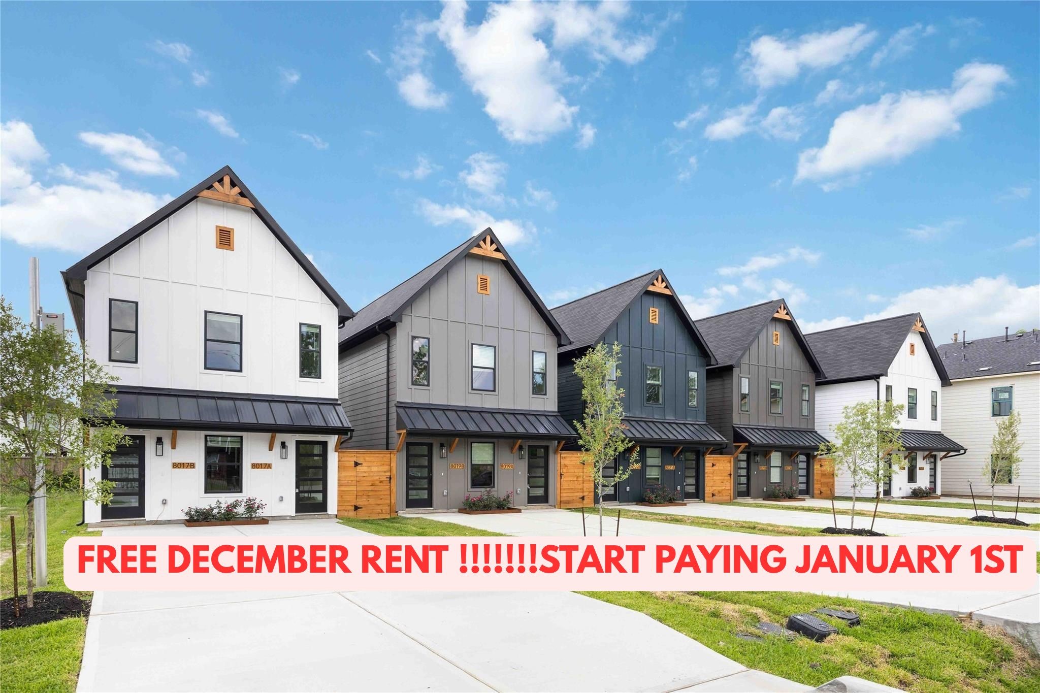 a front view of residential houses with street