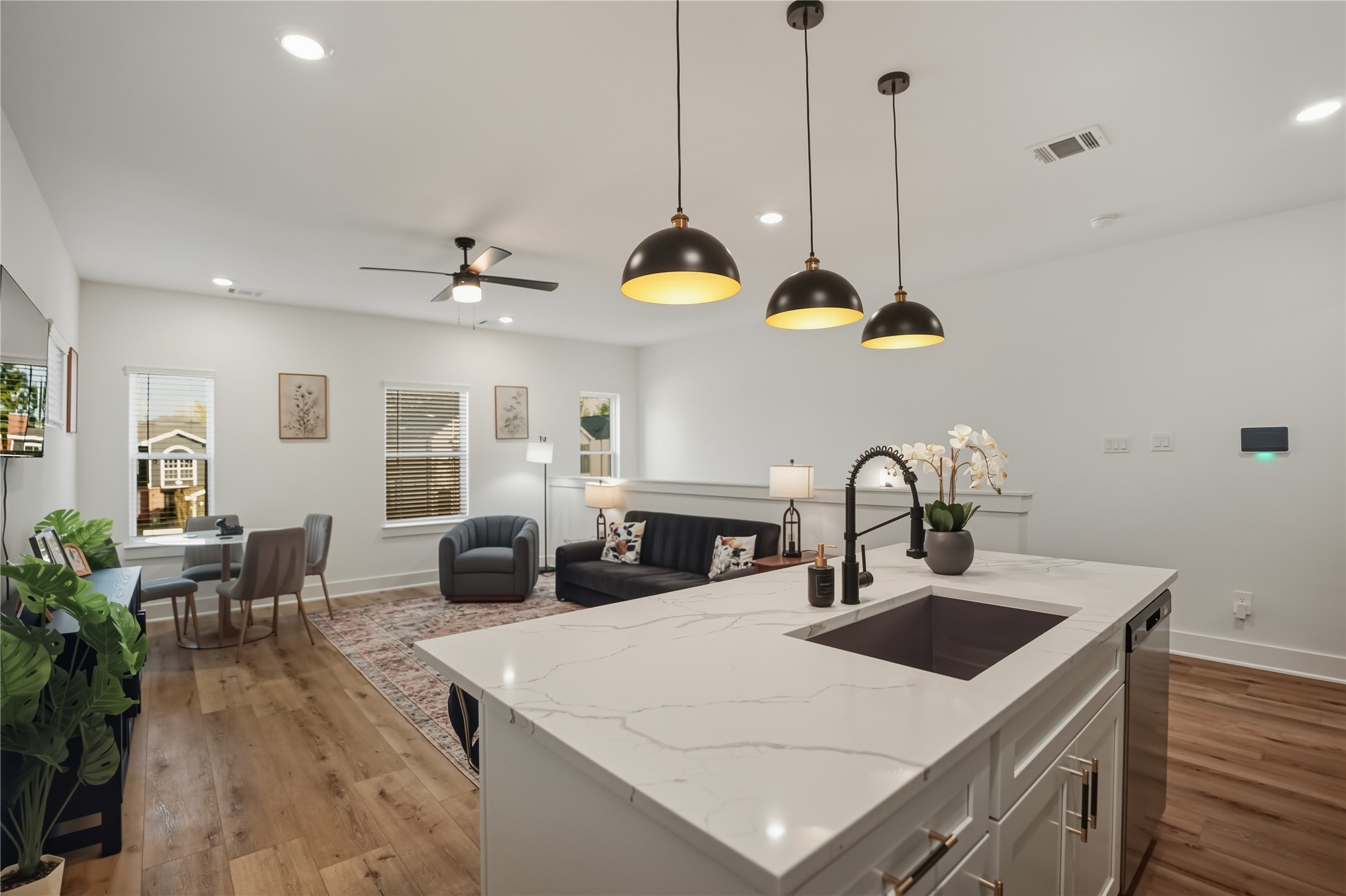 8017 B Cora Street Houston, TX 77088 - Photo 9 of 29 a kitchen with stainless steel appliances a sink a counter space appliances and cabinets