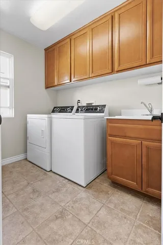 a view of a house with a yard and plants