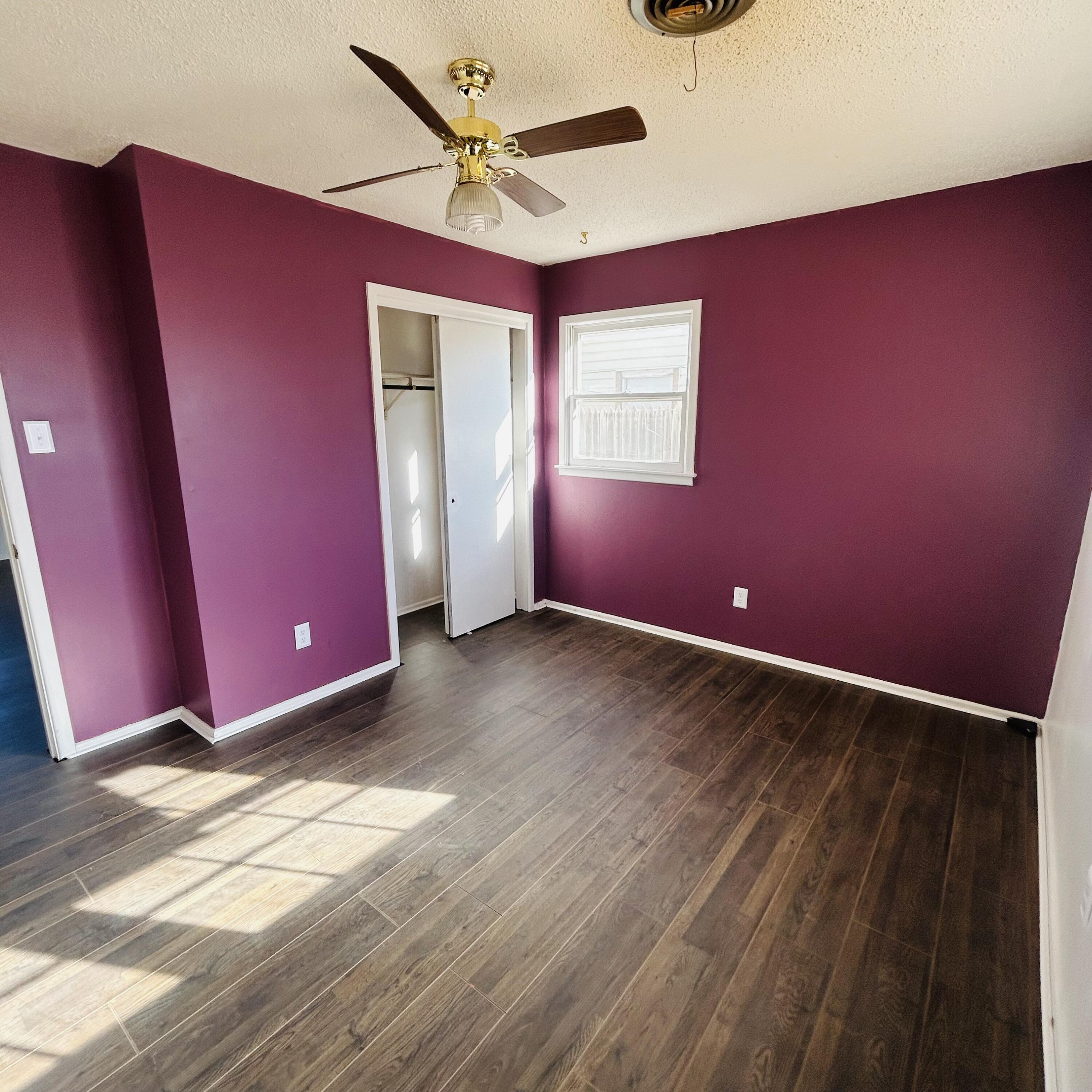 1918 71st Street Lubbock, TX 79412 - Photo 12 of 25 a view of a livingroom with wooden floor