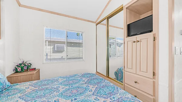 a view of a patio with dining table and chairs