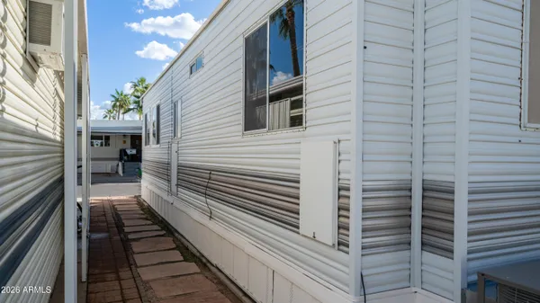 a swimming pool with outdoor seating and deck view