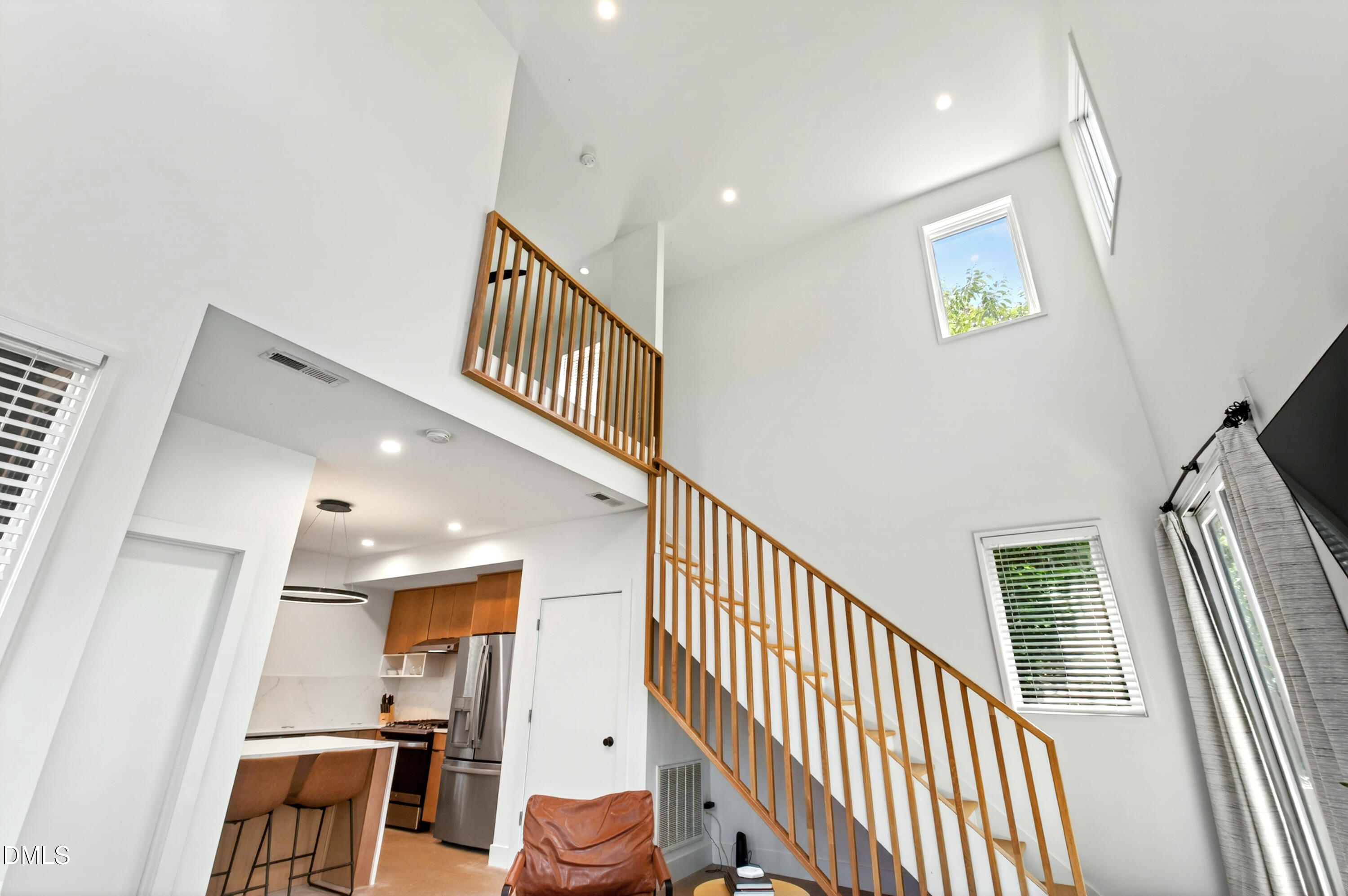 2159 Mayview Road, Unit B Raleigh, NC 27607 - Photo 15 of 50 a view of entryway with stairs and wooden floor
