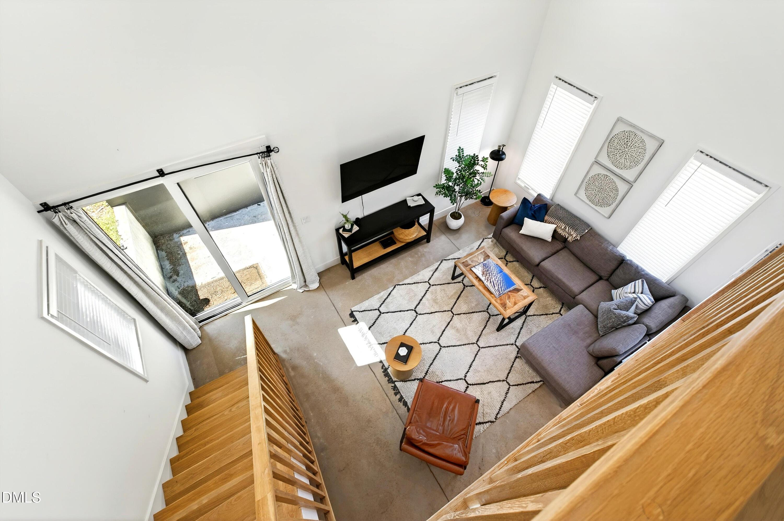 2159 Mayview Road, Unit B Raleigh, NC 27607 - Photo 22 of 50 a living room with furniture and a flat screen tv