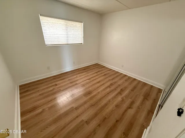 a view of a house with outdoor space and sitting area