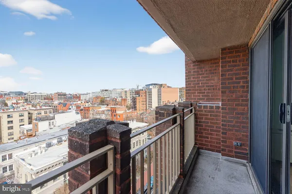 a view of a balcony with city view