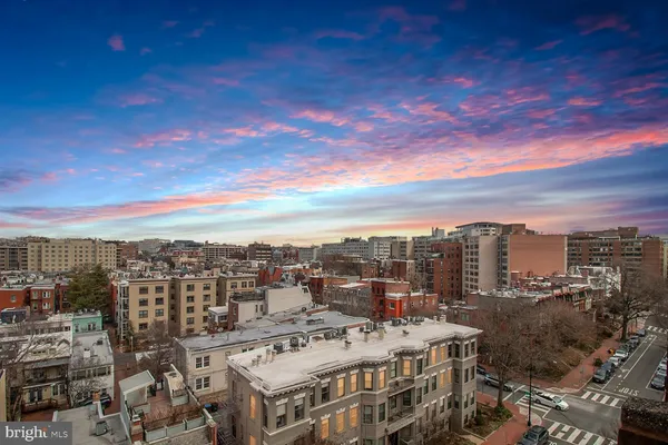 a view of a city with tall buildings