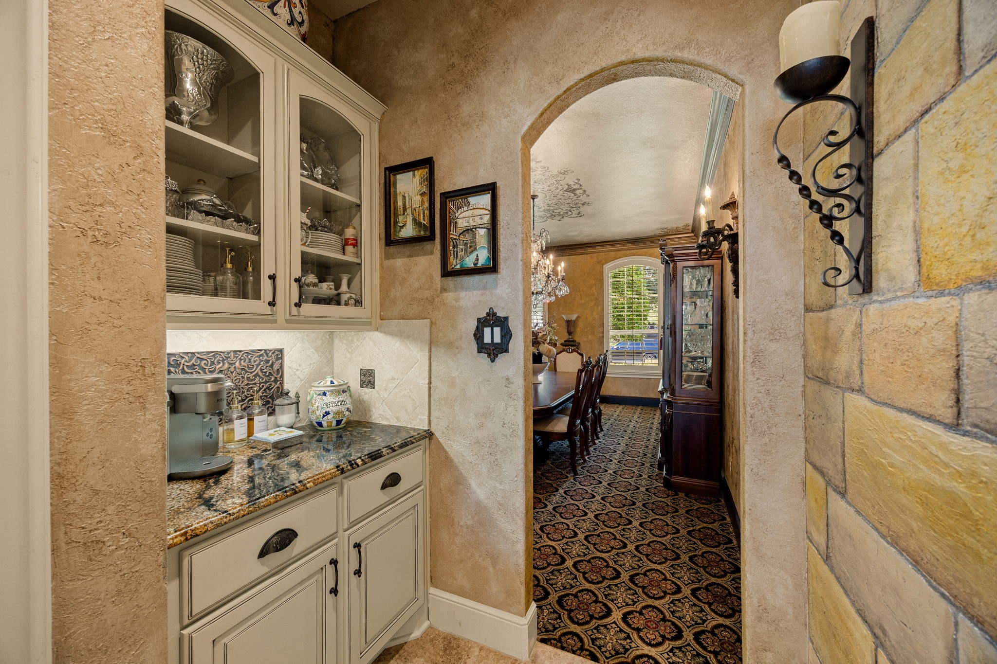 26515 Ashley Ridge Lane Katy, TX 77494 - Photo 20 of 50 The butler pantry continues to emulate the rich and ornate features of the kitchen, creating the perfect transition into the formal dining room.