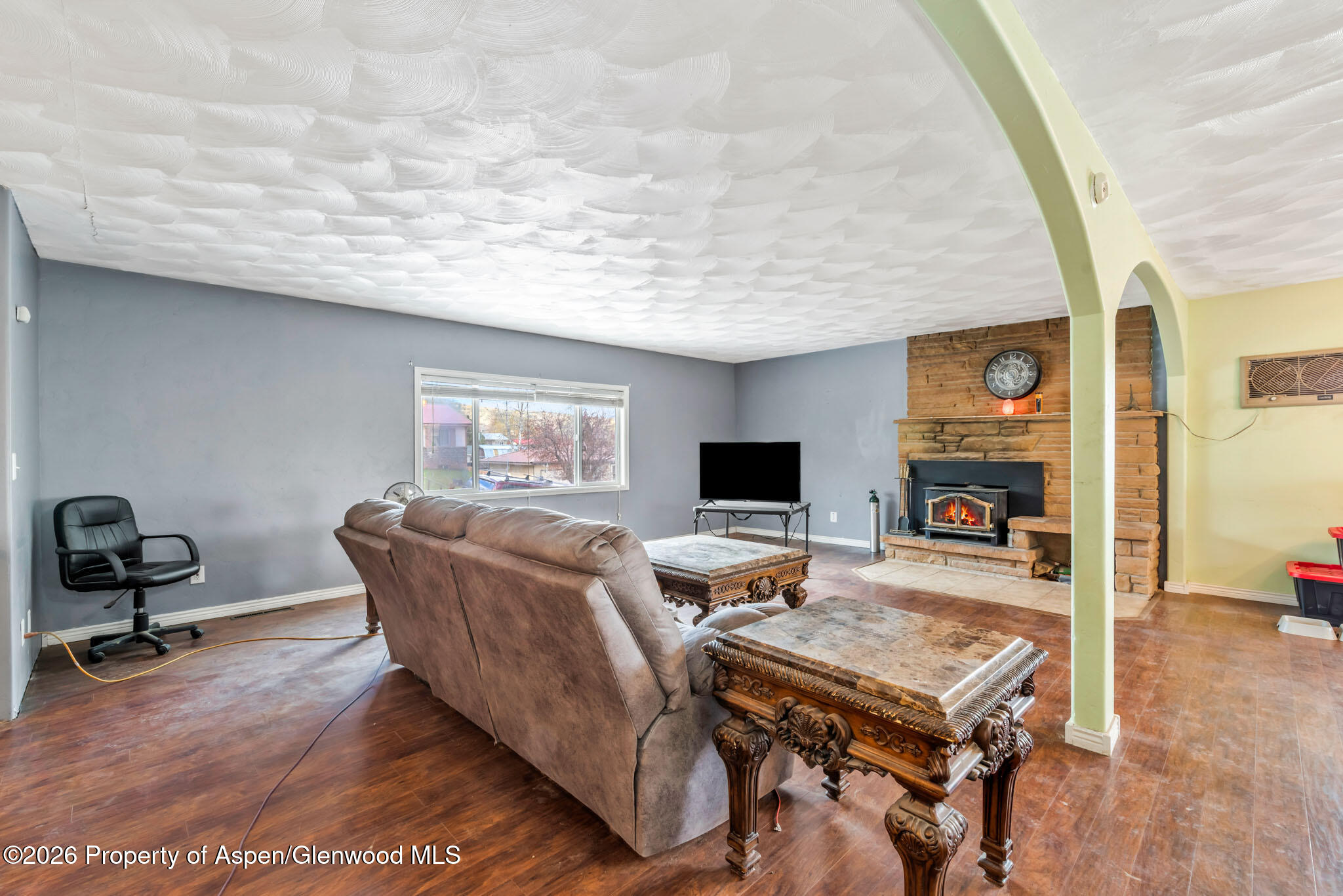 1141 Breeze Street Craig, CO 81625 - Photo 11 of 28 a living room with furniture and a flat screen tv