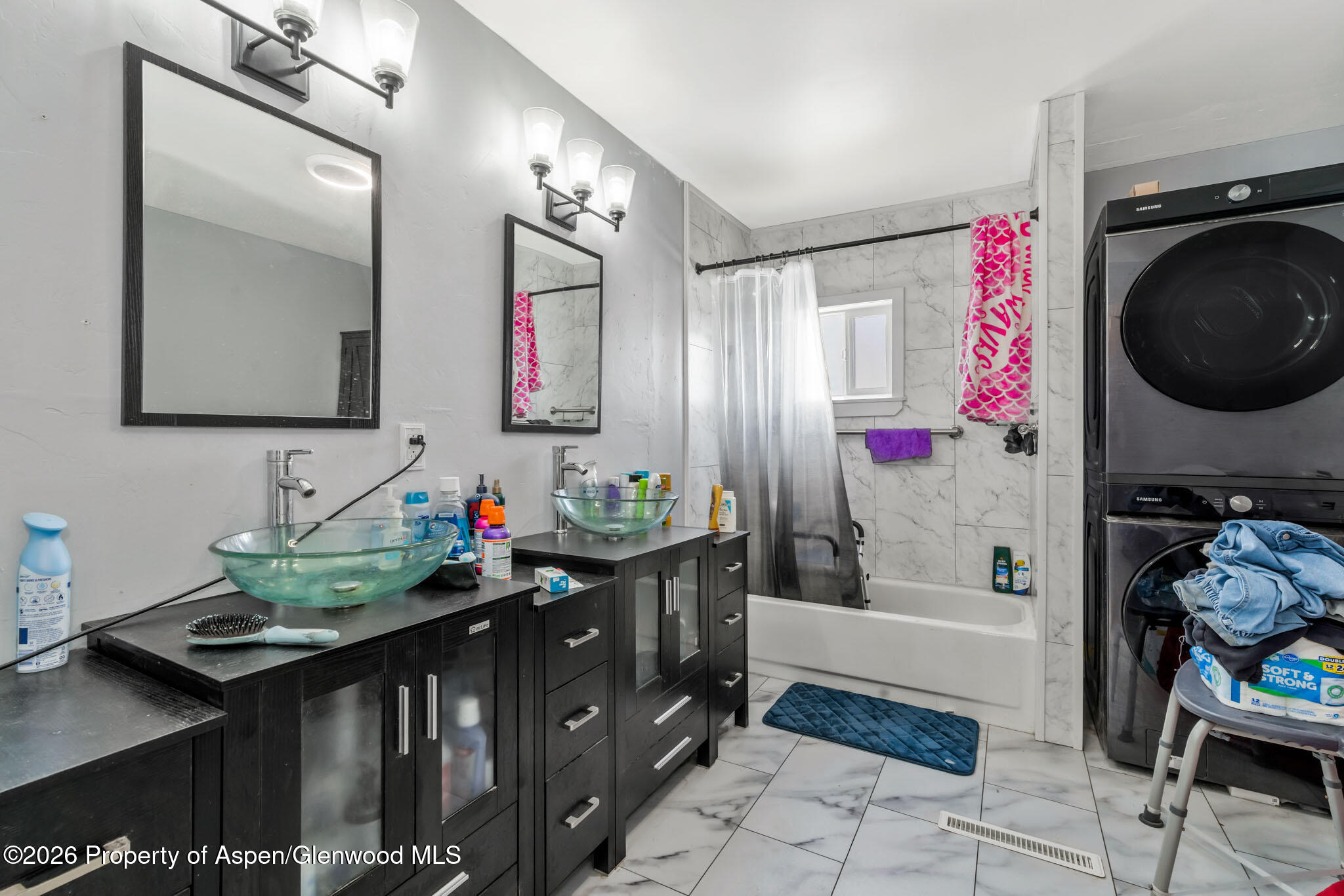 1141 Breeze Street Craig, CO 81625 - Photo 13 of 28 a bathroom with a sink mirror and vanity