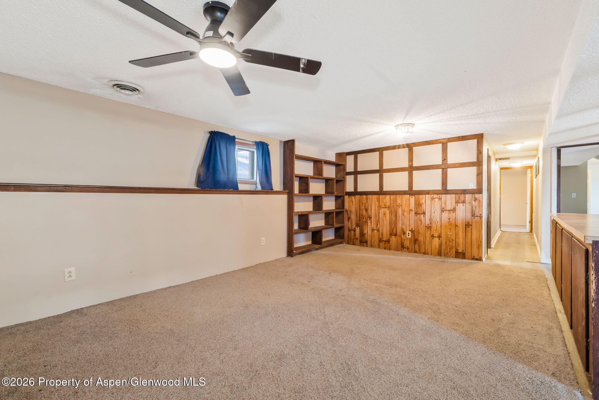 1141 Breeze Street Craig, CO 81625 - Photo 18 of 28 a view of an empty room with a window