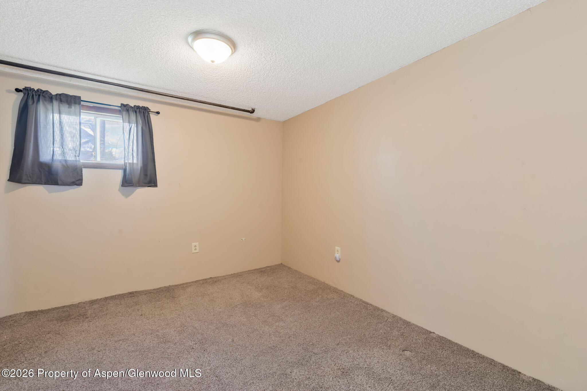 1141 Breeze Street Craig, CO 81625 - Photo 21 of 28 a view of an empty room