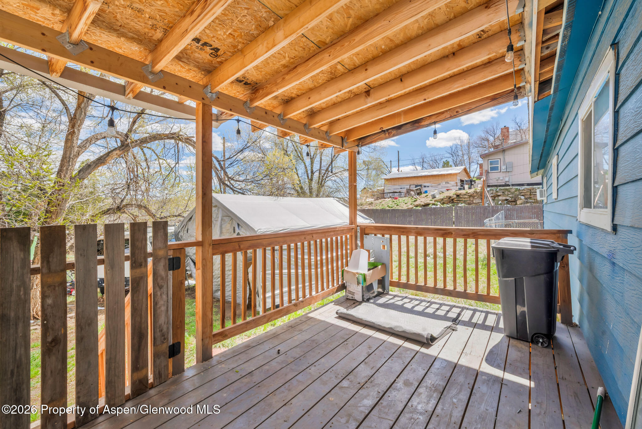 1141 Breeze Street Craig, CO 81625 - Photo 25 of 28 a view of a balcony with wooden floor