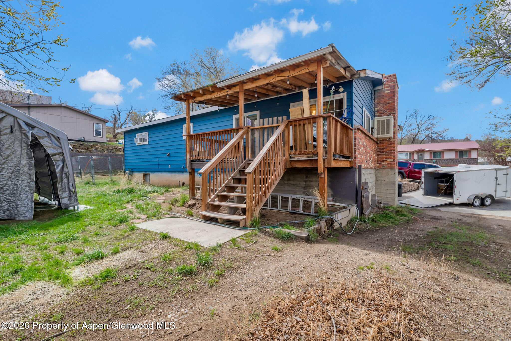 1141 Breeze Street Craig, CO 81625 - Photo 26 of 28 a view of a house with a yard