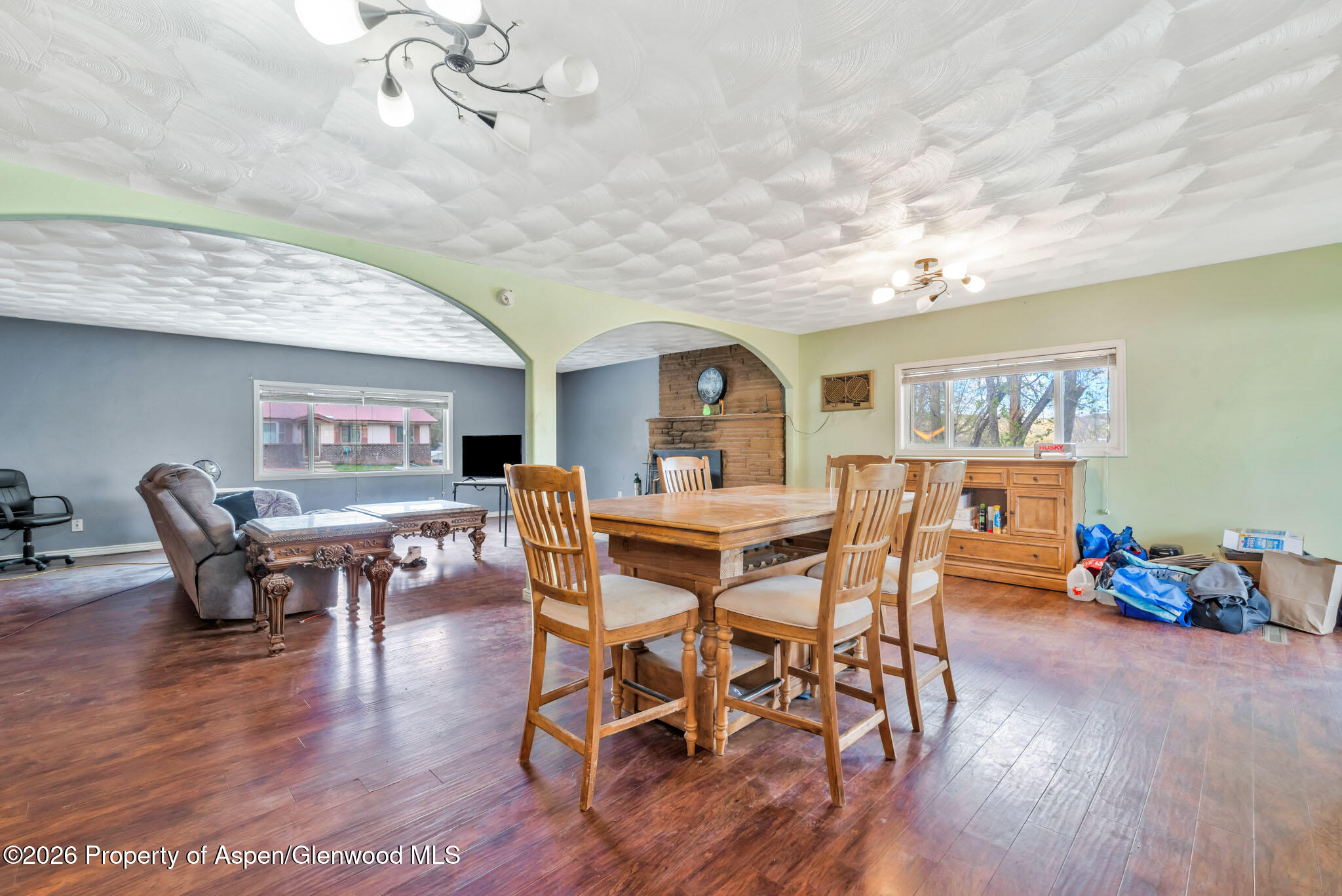 1141 Breeze Street Craig, CO 81625 - Photo 8 of 28 a view of a dining room with furniture window and wooden floor