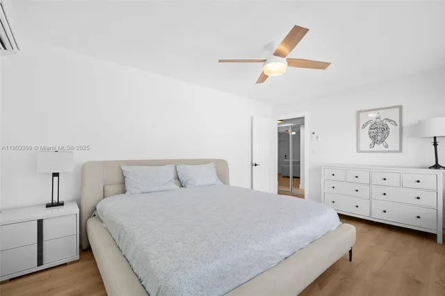 a bed room with a bed and a window