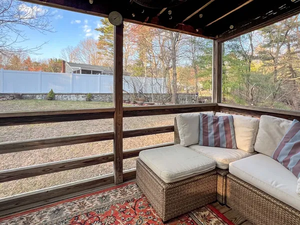 a living room with a couch and a table