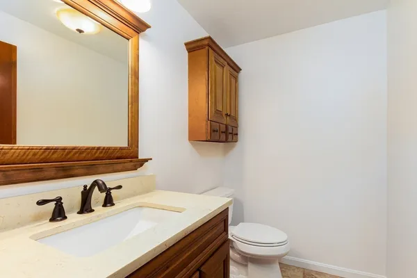 a bathroom with a sink and a toilet