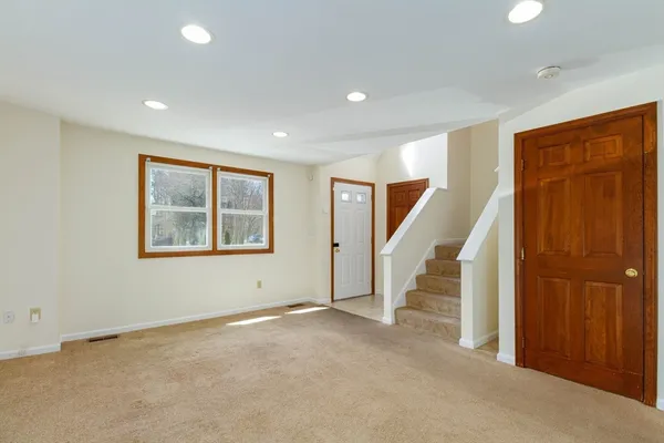 a view of an entryway with staircase