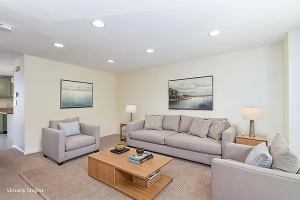 a living room with furniture and a couch