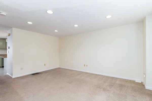 an empty room with a projector