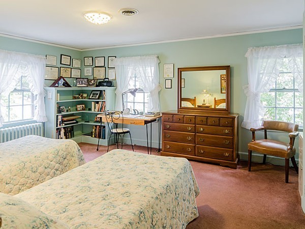 25 Wauwinet Road Newton, MA 02465 - Photo 17 of 25 a bed room with a bed and a chair