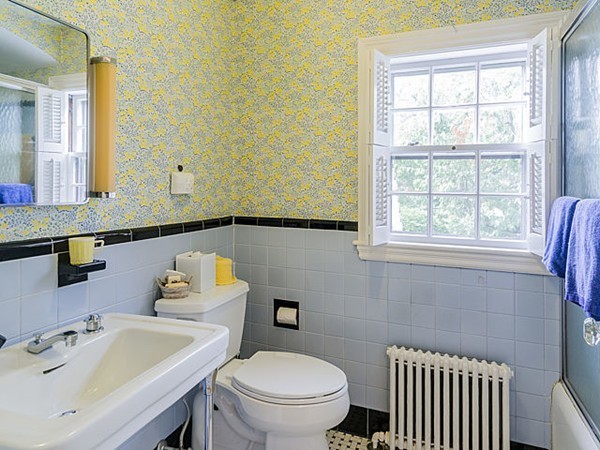 25 Wauwinet Road Newton, MA 02465 - Photo 20 of 25 a bathroom with a sink a toilet and a mirror