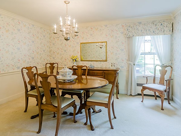 25 Wauwinet Road Newton, MA 02465 - Photo 4 of 25 a view of a dining room with furniture and chandelier