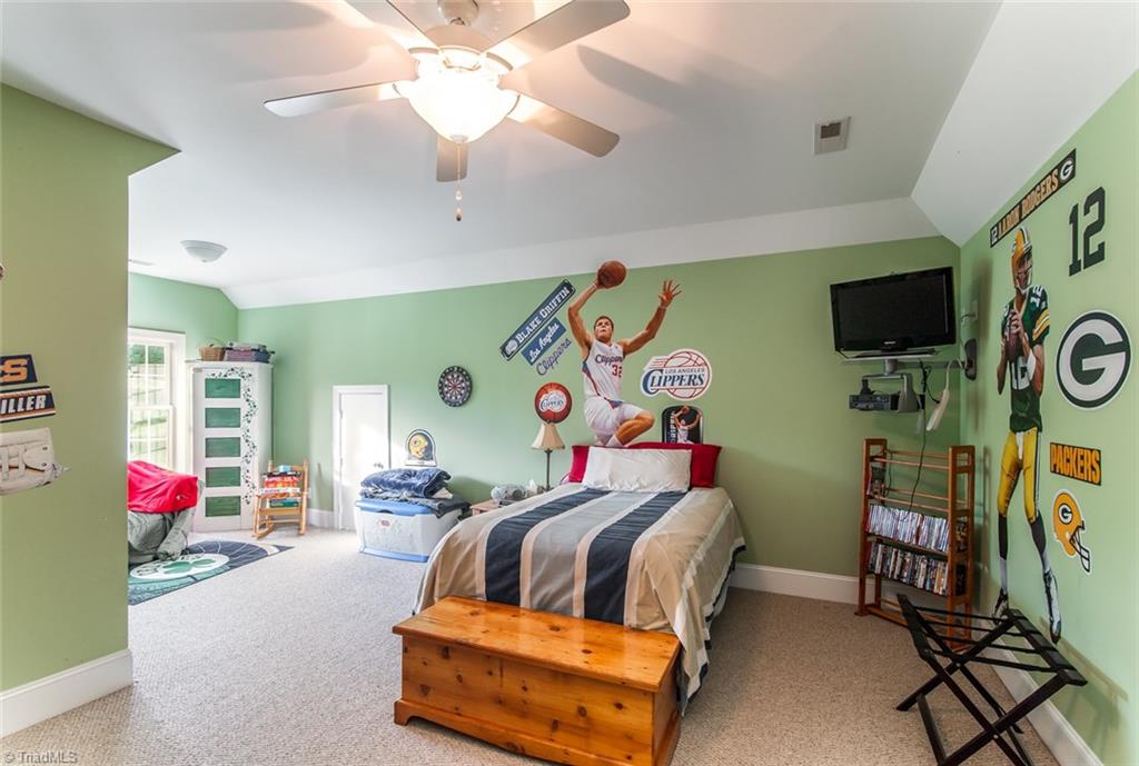 5802 Crutchfield Farm Road Oak Ridge, NC 27310 - Photo 23 of 30 Bonus room with sitting area to the left