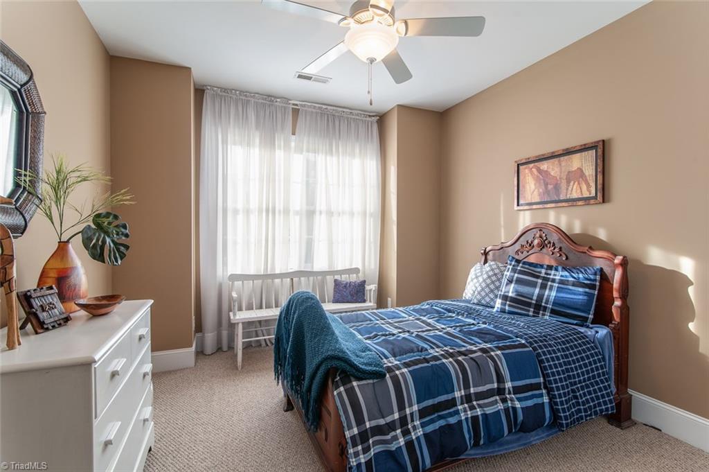 5802 Crutchfield Farm Road Oak Ridge, NC 27310 - Photo 25 of 30 One of the three upstairs bedrooms with a full bath right inside the hallway
