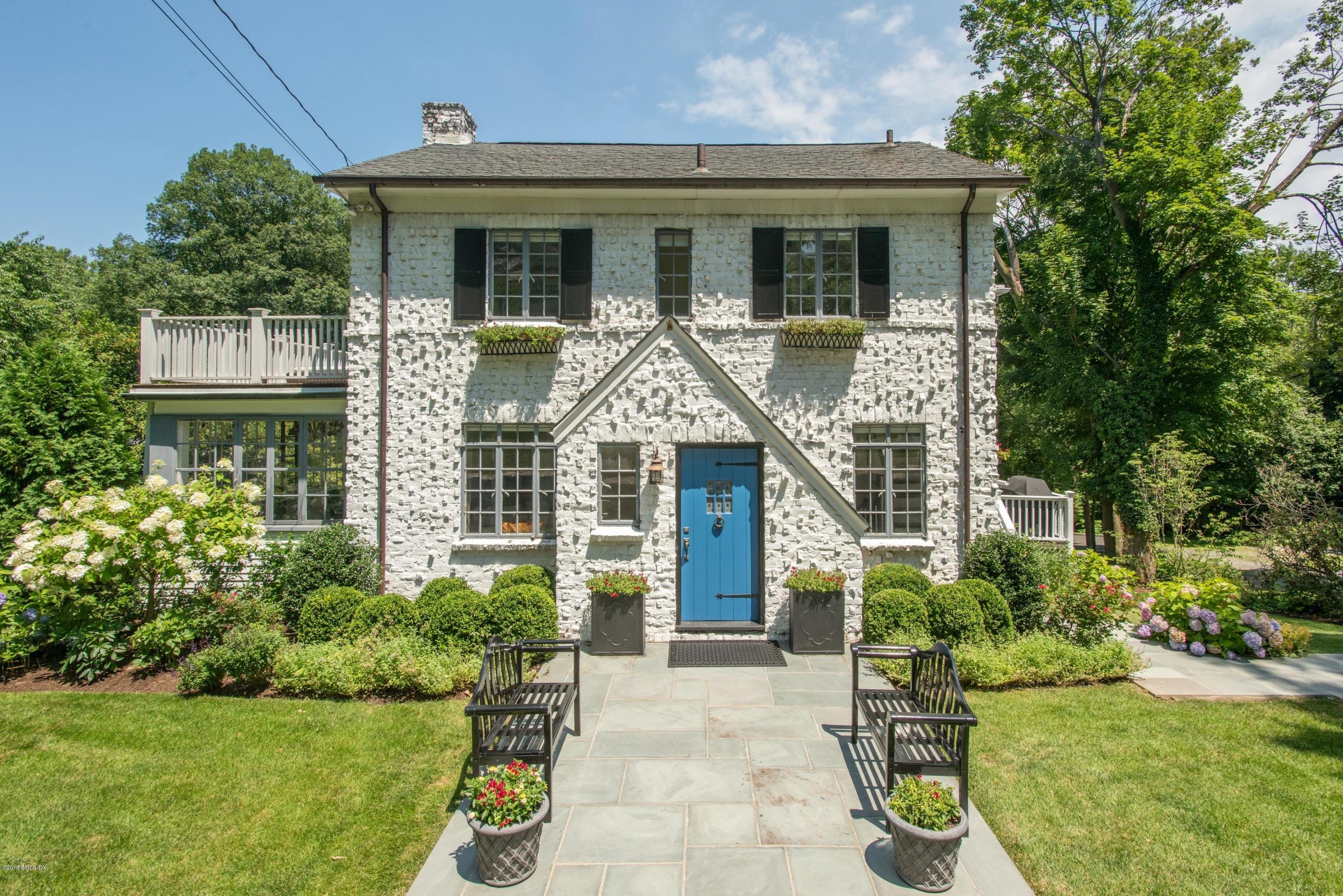34 Crescent Road Riverside, CT 06878 - Photo 1 of 37 a front view of a house with a yard