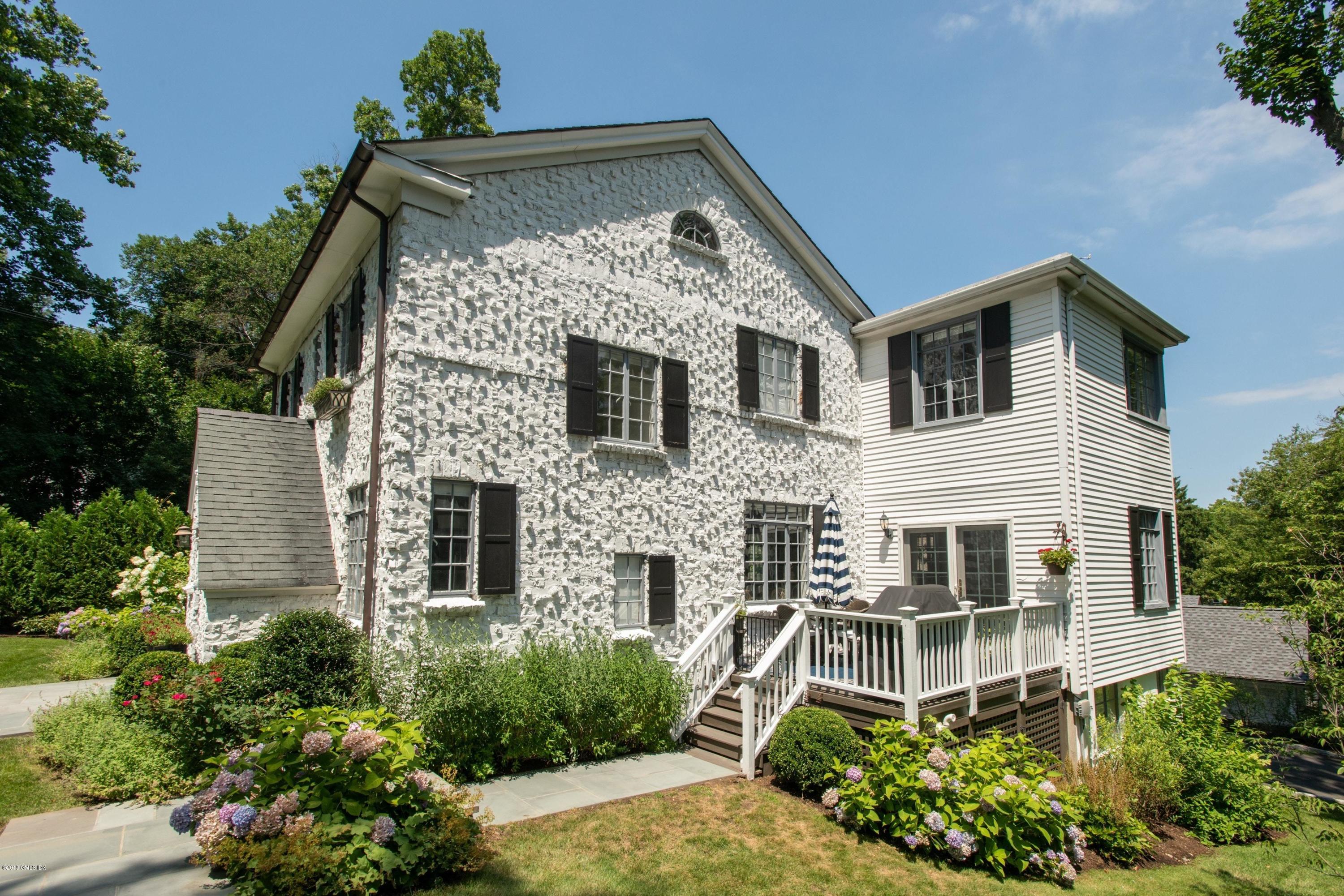 34 Crescent Road Riverside, CT 06878 - Photo 25 of 37 front view of a house with a small yard